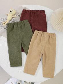 SHEIN 3 piezas Pantalones casuales de pana de unicolor para bebé niño, con cintura elástica acolchada, disponibles en 3 colores, cómodos. Estos pantalones de pana para bebé niño tienen un diseño clásico y una tela suave, adecuados para diversas ocasiones casuales. Ya sea en el hogar, actividades al aire libre o celebraciones festivas, pueden mostrar la ternura y el estilo del bebé. Su estilo minimalista y sus colores versátiles lo convierten en una opción ideal para crear un bebé adorable. - Multicolor - Ver 2