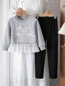 Ensemble de tenues pour filles avec Sweat-shirt ample à manches longues raglan col rond avec accent de nœud en dentelle florale brodée, associé à un legging skinny de couleur unie à taille élastique. Tenue décontractée pour tous les jours et toutes les saisons