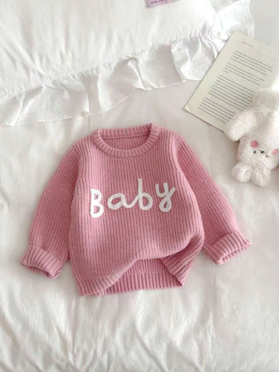SHEIN Vintaside Kids 女婴刺绣粉色套头毛衣,适合春秋季穿着,冬季也可作为内搭。精致的刺绣更添可爱俏皮的魅力。适合家庭聚会、万圣节、新年、感恩节、圣诞节、复活节、国庆节、派对、除夕等场合。婴儿针织衫、婴儿毛衣、秋冬季女婴套头衫、女婴毛衣、婴儿服装、女童秋季毛衣、婴儿长袖上衣、婴儿服装、黑色婴儿上衣、幼儿上衣、婴儿服装、女童秋季毛衣、婴儿纯色针织毛衣、粉色婴儿毛衣、婴儿粉色毛衣、婴儿针织毛衣、婴儿套头衫。 - 藕粉色 - 查看 1