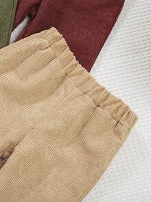 SHEIN 3 piezas Pantalones casuales de pana de unicolor para bebé niño, con cintura elástica acolchada, disponibles en 3 colores, cómodos. Estos pantalones de pana para bebé niño tienen un diseño clásico y una tela suave, adecuados para diversas ocasiones casuales. Ya sea en el hogar, actividades al aire libre o celebraciones festivas, pueden mostrar la ternura y el estilo del bebé. Su estilo minimalista y sus colores versátiles lo convierten en una opción ideal para crear un bebé adorable. - Multicolor - Ver 7