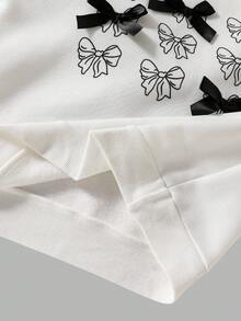 Conjunto de camiseta de manga larga con cuello redondo y estampado de lazos y pantalones para niñas preadolescentes - Blanco y Negro - Ver 5