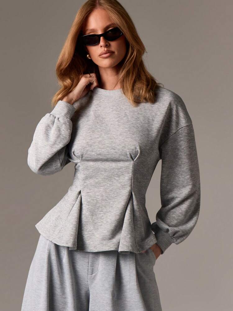 Peplum Hem Sweatshirt With Long Sleeves
