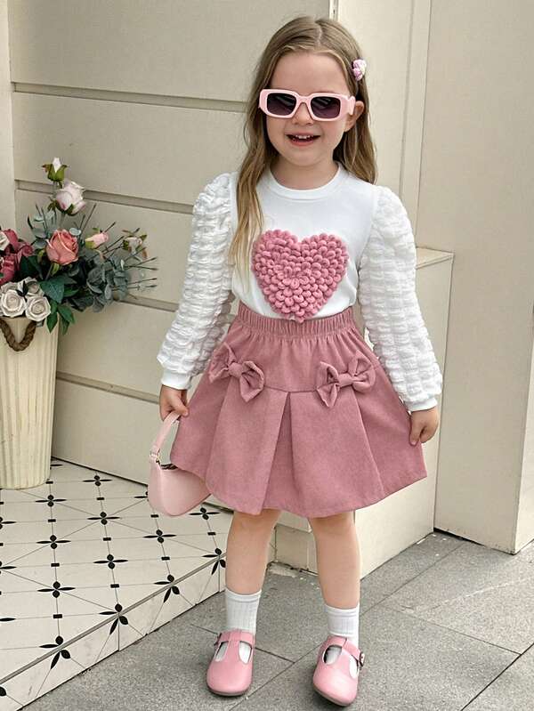 Set de 2 piezas para niña con estilo casual de uso diario y comodidad: Top de punto con mangas abullonadas con forma de corazón, falda de pana con decoración de moño, lindo y dulce para niñas, para primavera y otoño