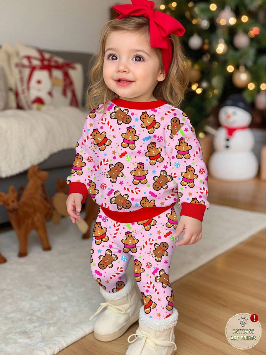 SHEIN Bộ đồ ngủ Giáng sinh Happikins cho bé gái, họa tiết người bánh gừng, kẹo gậy và ngôi sao trang trí cây thông, màu kem hồng, chất liệu mềm mại, dày dặn, tay dài, thích hợp cho mùa thu/đông, đi chơi, nghỉ lễ. - Nhiều màu - Xem 1