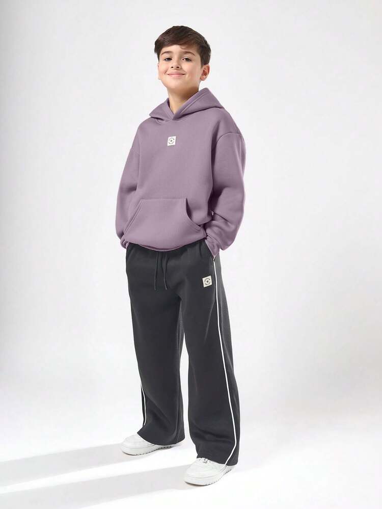 Felpa con cappuccio e pantaloni jogger a gamba larga