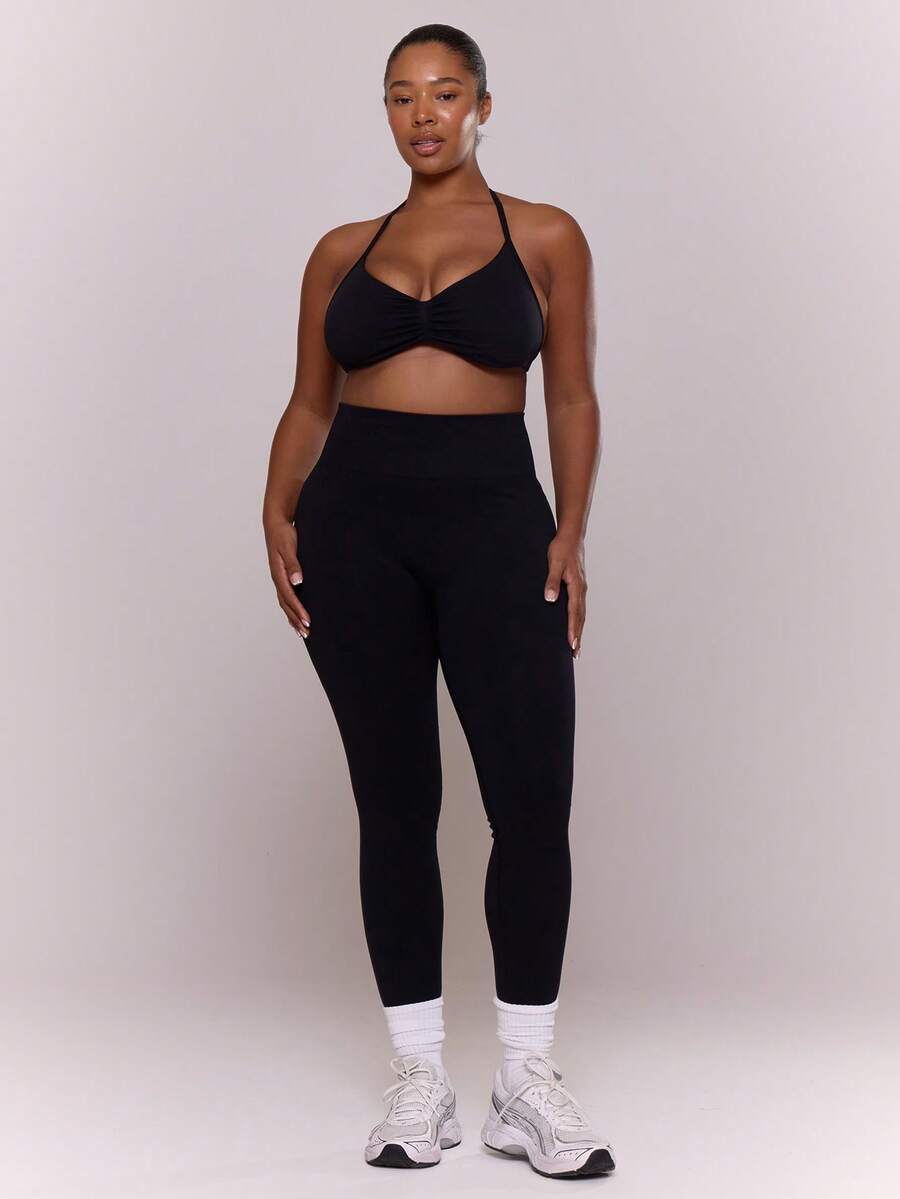 MUSERA Conjunto deportivo de top con cuello de halter y busto fruncido, talla grande talla, y pantalones ajustados. Ropa activa para gimnasio, pilates, yoga y actividades físicas que favorece la figura. - Amarillo - Ver 1