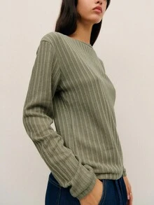 Nöista 这款优雅的绿色长袖罗纹上衣，后背饰有时尚的交叉设计，是春假期间女性的理想之选，无论优雅还是休闲造型，都能增添精致感。无论是生日、毕业典礼还是日常穿着，都是绝佳选择。 - 綠色 - 查看 1