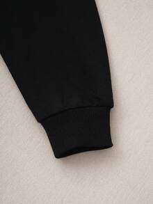 HELLO KITTY AND FRIENDS | SHEIN 少女骷髅字母图案宽松卫衣，休闲黑色套头卫衣