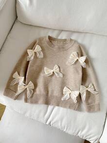 Genkimix Kids Girls'Solid Color Fashionable Sweet Bow Round Neck Sweater,Cute Beige Autumn Birthday Clothes For Kids,Back To School Outings Gathering Knitwear - Apricot - View 1