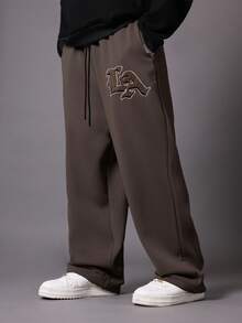 SUMWON 低裆慢跑运动裤，带刺绣徽标细节和抽绳腰部，休闲舒适