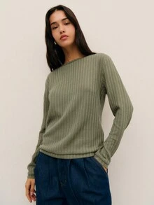 Nöista 这款优雅的绿色长袖罗纹上衣，后背饰有时尚的交叉设计，是春假期间女性的理想之选，无论优雅还是休闲造型，都能增添精致感。无论是生日、毕业典礼还是日常穿着，都是绝佳选择。 - 綠色 - 查看 2