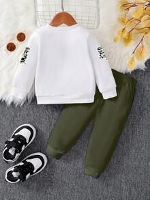 SHEIN Ensemble sweat-shirt à col rond avec graffitis peints à la main et anglais, et pantalon/jogging pour bébé garçon. Style automne/hiver décontracté et confortable. Convient pour l'automne/l'hiver, léger et douillet. Parfait pour les sorties décontractées, les fêtes, les activités extérieures, les cadeaux - Multicolore - Voir 2