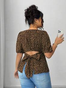 Elenzga Chemise décontractée grande taille à imprimé léopard et pois avec design à nœud dans le dos