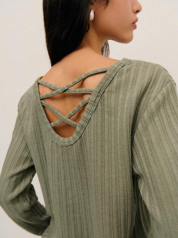 Nöista Soft Grey Ribbed Sweater With A Classic Round Neck And Long Sleeves; A Timeless Piece In Women's Winter Clothes, Perfect For Layering In Thanksgiving, Christmas, And New Year Looks.