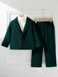 Souflis 4-7岁男童绅士西装套装，秋冬款，复古英伦风，采用橄榄绿色纯色顺滑西装面料制成，经典缺口翻领双排扣设计，搭配同款直筒裤，适合年轻男童T台走秀、生日派对、钢琴演奏会等正式场合，将小朋友打造成品质精致、格调优雅的复古绅士
