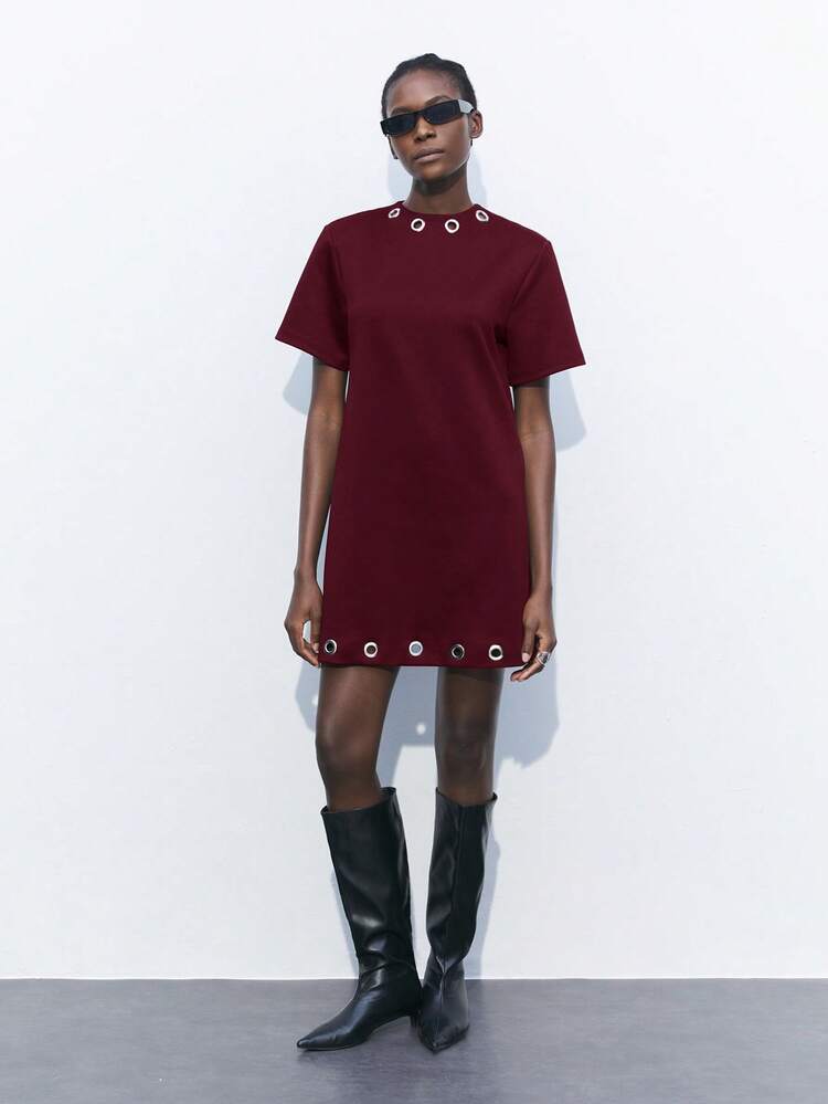 SHEIN Maija Women's Metal Grommet Decor Round Neck Short Sleeve Mini Dress, Hem Adorned With Exquisite Metal Accents, Straight Casual Silhouette, Combining Business, Leisure And Street Fashion. Minimalist Yet Elegant Design, Suitable For New Year Parties, Holidays Or Daily Gatherings, Showcasing Feminine Chic And Fashionable Aura