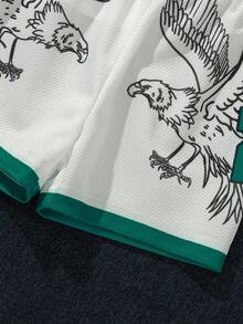 SHEIN Playful Pals Bộ 2 áo thun thể thao cổ chữ V tay ngắn dáng rộng thoải mái cho bé trai mới biết đi có họa tiết đại bàng và sọc + quần short lưới, quần áo trẻ sơ sinh/trẻ sơ sinh, 6 tháng-3 tuổi - trắng - Xem 5