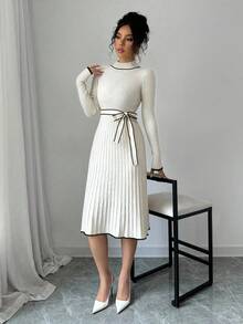 Rafferiza Elegancka, dopasowana sukienka z dzianiny, odpowiednia do dojazdów do pracy, spotkań towarzyskich, imprez, podróży, kempingu i aktywności na świeżym powietrzu. Sweter z dzianiny. Ubrania na jesień i zimę dla kobiet. - Morela - Zobacz 4