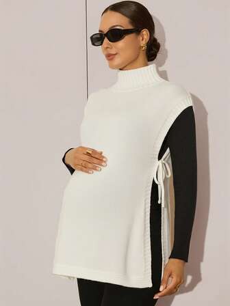 MaterniWear Enfärgad stickad väst med knytband i sidan och halvhög krage för gravida, höst/vinter