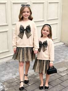 SHEIN Serisse Kids 少女3D豹纹蝴蝶结装饰圆领长袖卫衣裙，搭配全豹纹网纱下摆，适合秋冬季日常穿着 - 杏色 - 查看 11