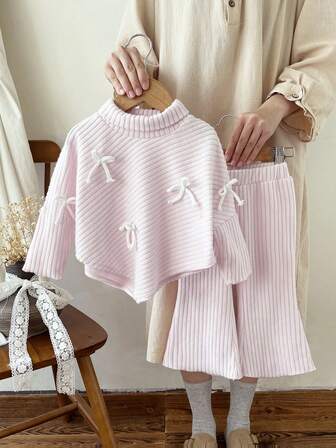 SHEIN 2pcs Baby Girls' Bow Decor Knitted Set, Light Apricot Turtleneck Top Paired With Matching Flare Pants, Cute & Casual For Autumn/Winter