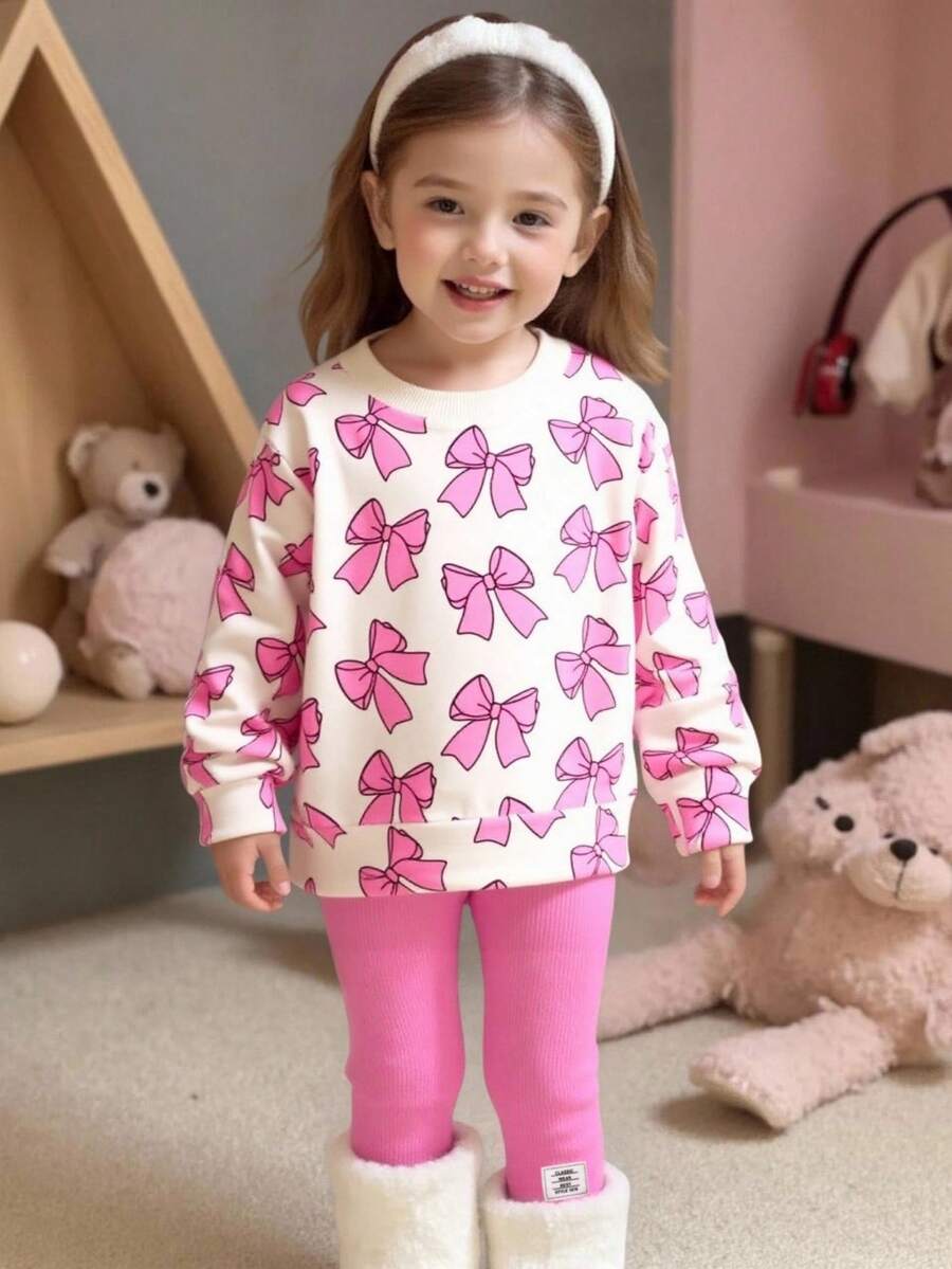 SHEIN 2 件套女婴春秋新款罗纹领蝴蝶结印花运动衫和修身打底裤套装,简约可爱运动休闲装 - 杏色 - 查看 1