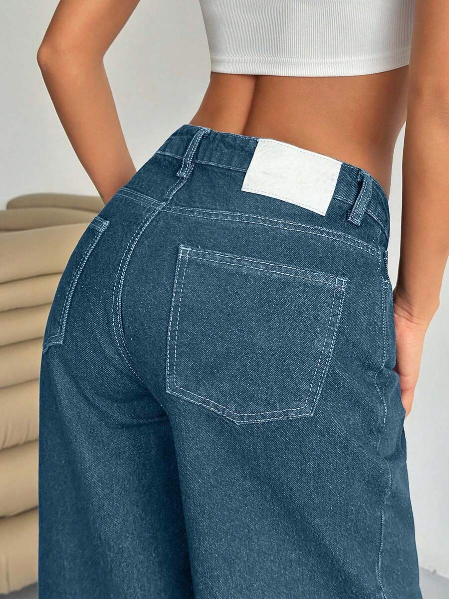 EURMUSE Pantaloni casual a vita bassa e gamba ampia per donne, di colore blu scuro con etichetta sul retro e lavaggio ad acqua - Blu lavato medio - Visualizzare 1