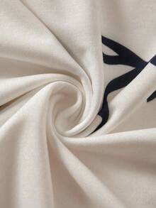 SHEIN 少女运动套装，秋冬新款，杏色数码印花卫衣配黑色蝴蝶结，黑色修身裤配白色蝴蝶结装饰，舒适合身 - 杏色 - 查看 3