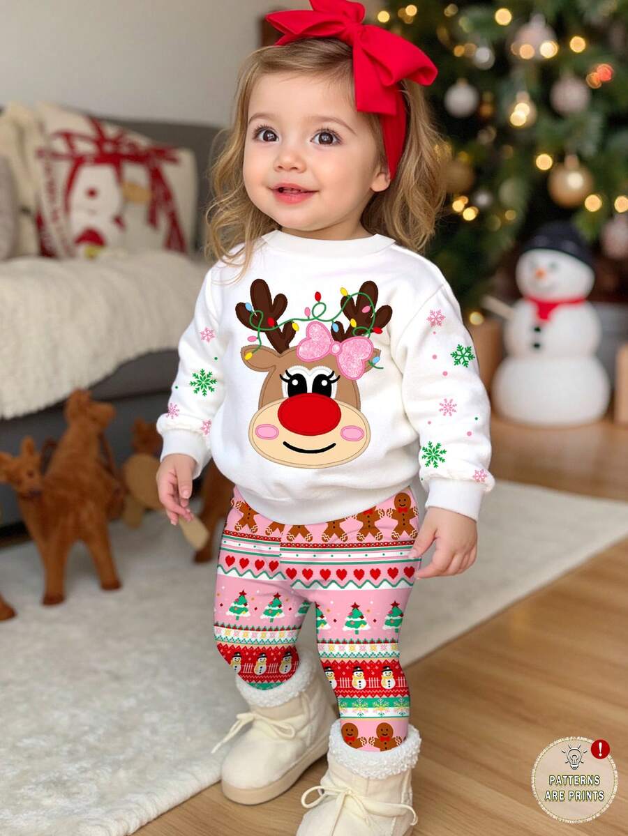 SHEIN Bộ đồ Happikins Merry Christmas dễ thương với hình tuần lộc hoạt hình, bông tuyết, cây thông Noel, chuông, kẹo gậy, người tuyết, chất liệu mềm mại, dày dặn, cổ tròn, tay dài và quần legging, phù hợp cho bé gái vào mùa thu/đông dịp Giáng sinh. Bộ đồ ngủ Giáng sinh cho bé gái, bộ đồ ngủ Giáng sinh dài tay cho bé gái, bộ đồ Giáng sinh cho bé gái. - Nhiều màu - Xem 1