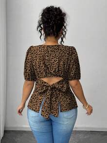 Elenzga Chemise décontractée grande taille à imprimé léopard et pois avec design à nœud dans le dos