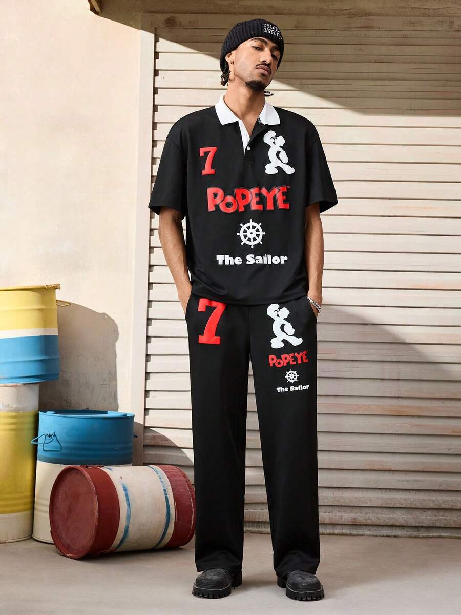 Popeye X SHEIN طقم تي شيرت بأكمام قصيرة وبنطلون كاجوال مطبوع عليه رسومات حرفية للرجال، صيفي - الأسود - مشاهدة 1