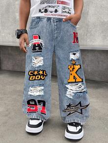 SHEIN 幼儿/男童水洗涂鸦字母印花破洞宽松直筒黑色牛仔裤，适合儿童穿着，街头服饰，四季皆宜。