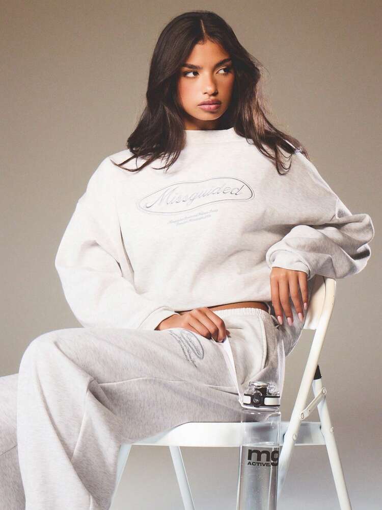 MISSGUIDED Luźna bluza z długim rękawem i okrągłym dekoltem oraz nadrukowanym logo w stylu vintage, idealna na co dzień i na weekendowy wypoczynek