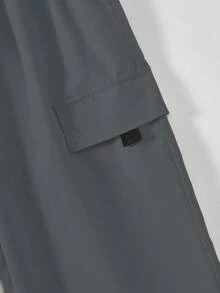 SHEIN 2pcs Tween Boys' Print Black Short Sleeve T-Shirt + Khaki Cargo Pants Casual Suit, Spring/Summer