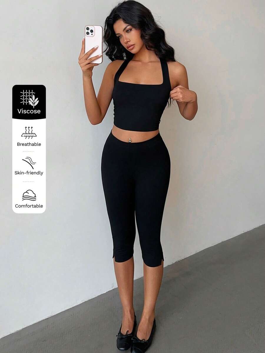 Flirla Bộ 2 áo crop top cổ lọ đơn giản và quần legging xẻ gấu ôm vừa vặn, phù hợp cho mọi mùa - màu đen - Xem 1