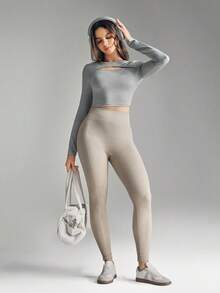 SHEIN Sports Women's Solid Color Minimalist Long Sleeve Casual Sports T-Shirt Gym Shirt Women Seamless Work Out Top Hollow Out Crop Sports Shirt Long Sleeve Workout Top Gym Top Women Long Sleeve Crop Top Gym Crop Top Hollow Out Long Sleeve Top Women Long Sleeve Gym Top - Grey - View 3