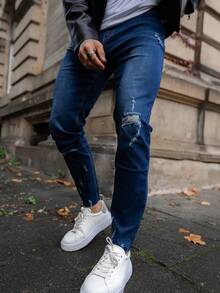 Artur Kramer Men Ripped Raw Cut Skinny Jeans - Dark Wash - View 1