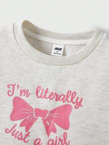 JNSQ Ensemble de 2 pièces pour jeunes filles, Top Sweat-shirt col rond avec nœud imprimé et bordure en dentelle + pantalon de jogging droit ample, convient pour le port quotidien en automne et hiver, les activités extérieures, les vacances, le style de rue, les fêtes et les tenues décontractées