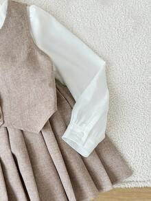 SHEIN Jeune fille Gilet élégant à boutons dorés, Chemise à col volant, Et jupe plissée polyvalente, Convient pour l'automne/l'hiver, les fêtes et le port quotidien - Tabac - Voir 7
