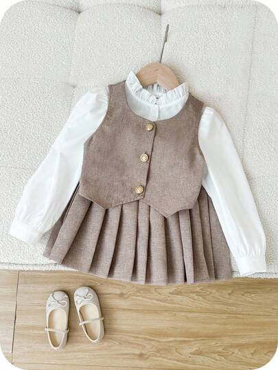 SHEIN Áo vest cài nút vàng thanh lịch cho bé gái, áo sơ mi cổ nhún bèo và chân váy xếp ly đa năng, phù hợp mặc mùa thu/đông, tiệc tùng và mặc hàng ngày