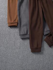 SHEIN Explorewe Pantalones jogger casuales de unicolor con cordón en la cintura para niño preadolescente - Multicolor - Ver 4