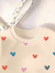 女婴男女通用婴儿幼儿6个月-3岁休闲优雅甜美套头卫衣裙，可爱心形图案下摆薄纱设计，舒适圆领长袖薄纱卫衣裙，适合秋冬春季穿着，轻盈舒适，是秋冬季的理想之选，时尚休闲装扮，适合返校、聚会、户外野餐、街头摄影、假期、送礼等场合。 - 彩色 - 查看 4