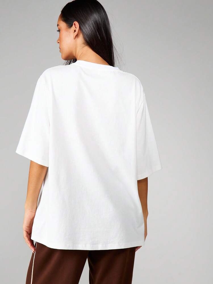 MISSGUIDED T-shirt oversize col rond avec petit logo imprimé en cercle, manches courtes, coupe décontractée en coton pour un port casual au quotidien