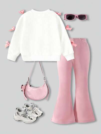 SHEIN Elladie kids 两件套女童甜美酷炫3D蝴蝶结装饰白色上衣+黑色喇叭裤套装，黑色上衣饰有多个粉色蝴蝶结，搭配时尚的紫红色喇叭裤，甜美时尚，适合返校、外出、街头风格。