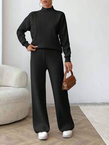 EURMUSE Conjunto de suéter y pantalones de mujer con cuello alto simulado, botones y hombros caídos, en color liso - Negro - Ver 4
