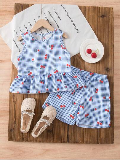 Conjunto de camiseta de tirantes y pantalones cortos con estampado de cuadros y cerezas para niña