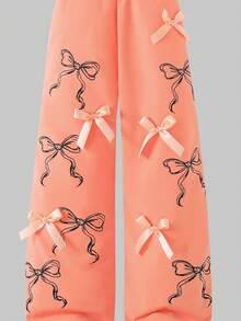 SHEIN Sparklyn Áo nỉ cổ tròn màu trắng in chữ và nơ màu hồng dễ thương cho bé gái 8-12 tuổi, kết hợp với quần cạp rút màu hồng, bộ 2 món - Màu Hồng  Dưa hấu - Xem 6