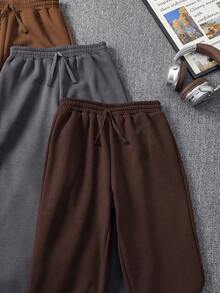 SHEIN Explorewe Pantalones jogger casuales de unicolor con cordón en la cintura para niño preadolescente - Multicolor - Ver 3