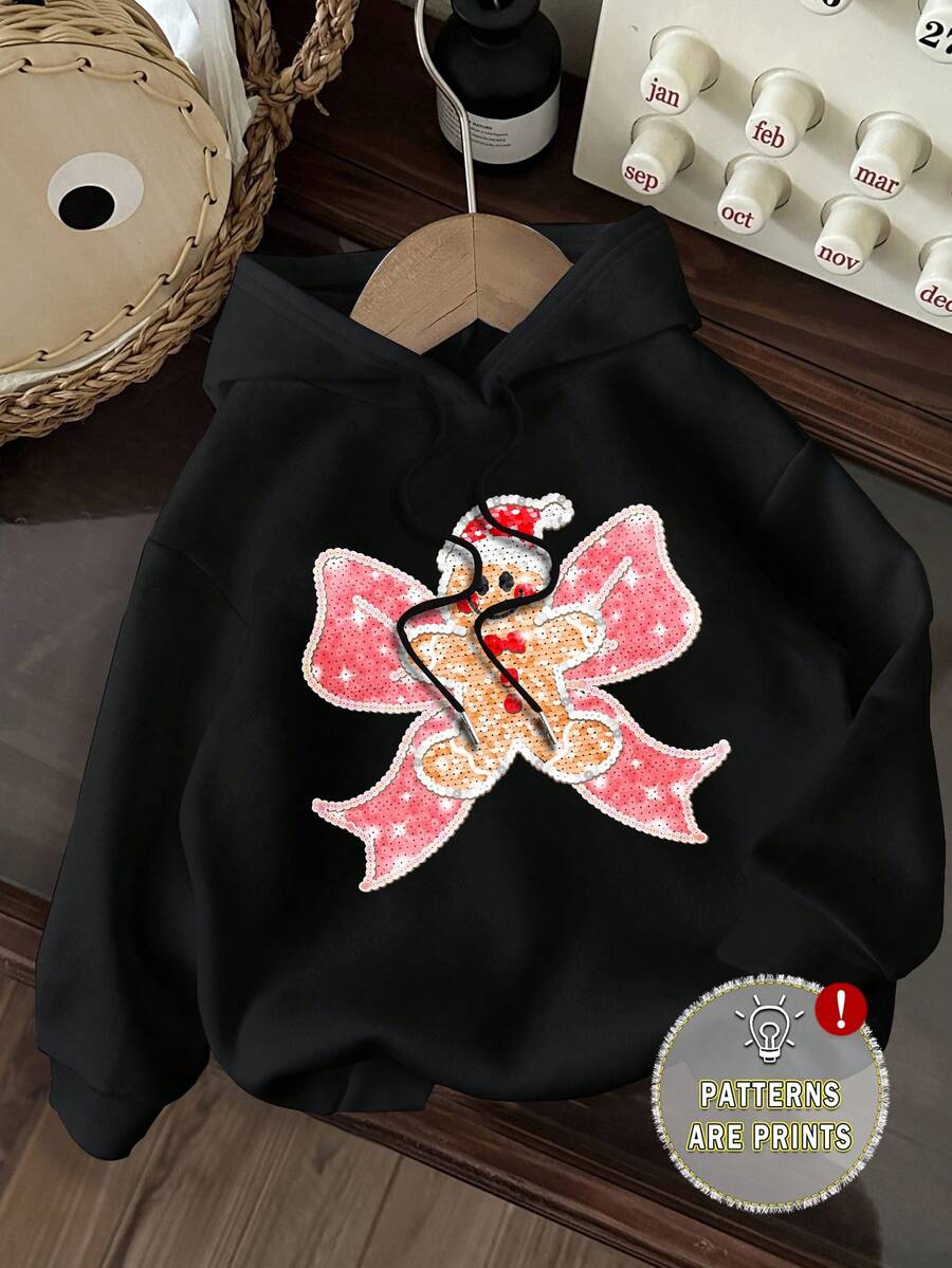 SHEIN EZwear 休闲舒适圣诞仿亮片刺绣姜饼人和蝴蝶结印花连帽宽松运动衫,适合圣诞节、派对、圣诞鹿、圣诞聚会、圣诞派对、家庭聚会、家庭、情侣、姐妹穿着 - 黑色 - 查看 1
