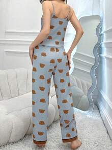 Bộ đồ ngủ áo hai dây và quần cổ chữ V in hình gấu - Nhiều màu - Xem 2